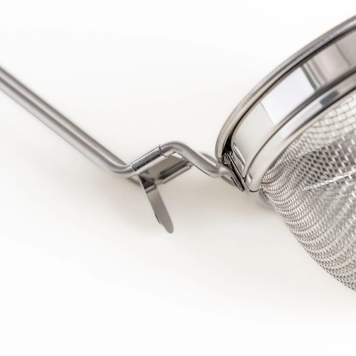 Stainless steel miso strainer with fine mesh and long handle perfect for making smooth miso soup.