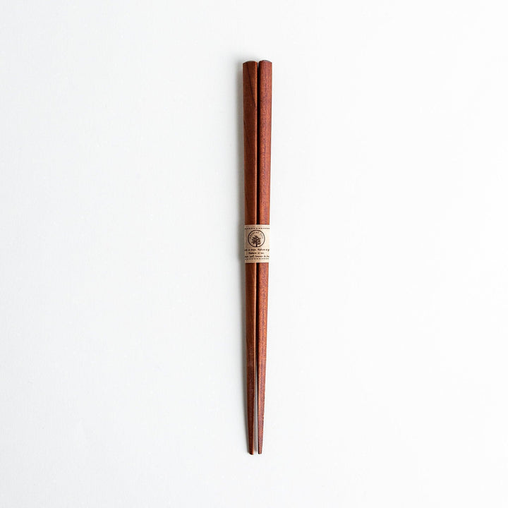 Three pairs of natural zelkova wood chopsticks, each with a different geometric shape—triangle, hexagon, and round.