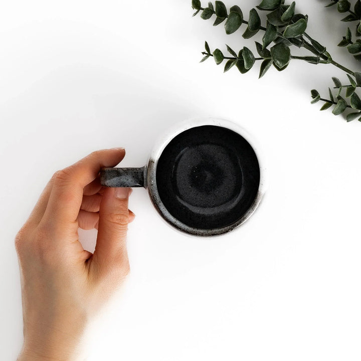 Charming Mug featuring two cats sitting together, surrounded by blooming flowers and birds.