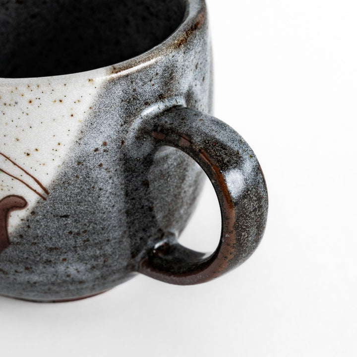 Charming Mug featuring two cats sitting together, surrounded by blooming flowers and birds.