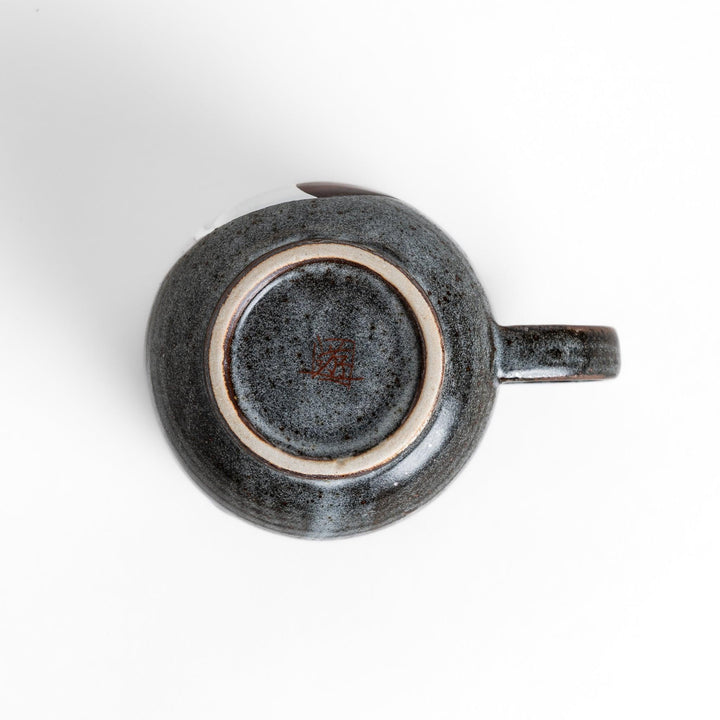 Charming Mug featuring two cats sitting together, surrounded by blooming flowers and birds.