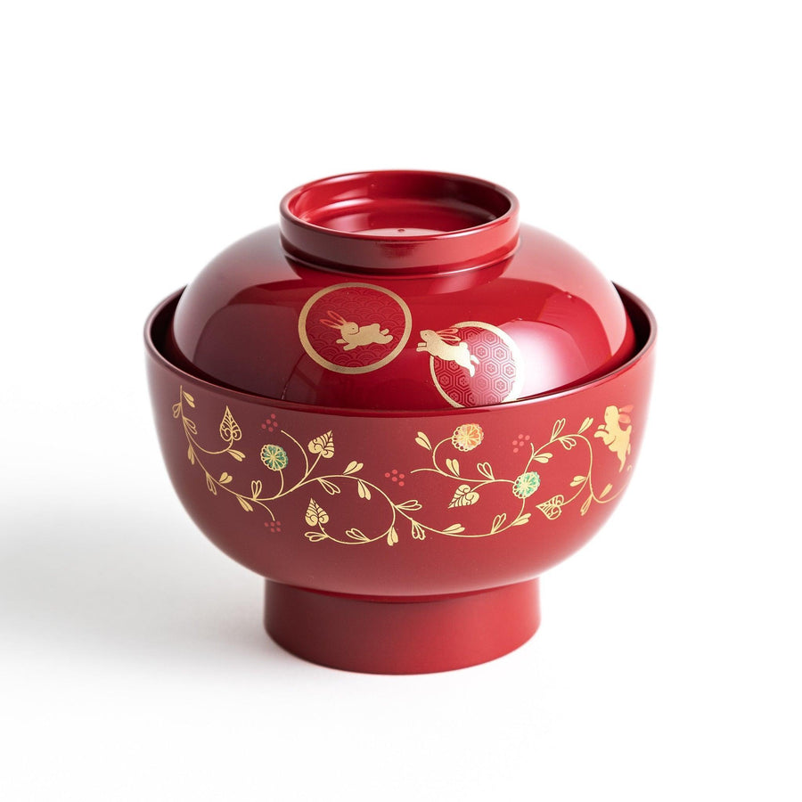 Lacquered soup bowls with lids, featuring golden vine designs. Available in red or black.