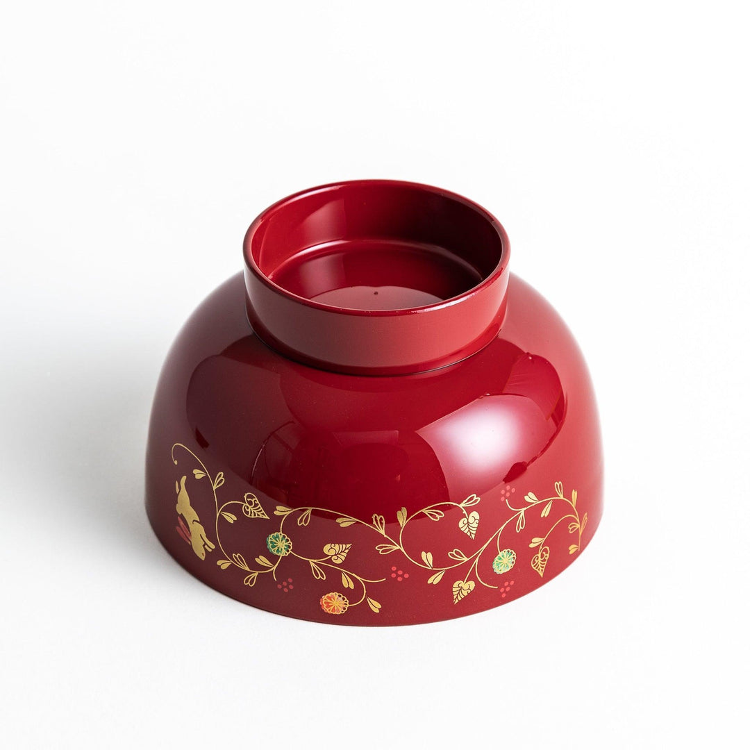 Lacquered soup bowls with lids, featuring golden vine designs. Available in red or black.