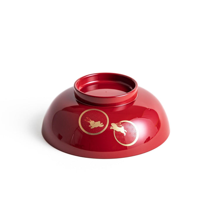 Lacquered soup bowls with lids, featuring golden vine designs. Available in red or black.