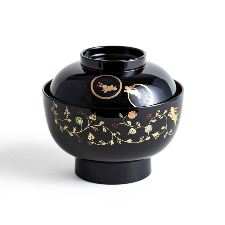 Lacquered soup bowls with lids, featuring golden vine designs. Available in red or black.