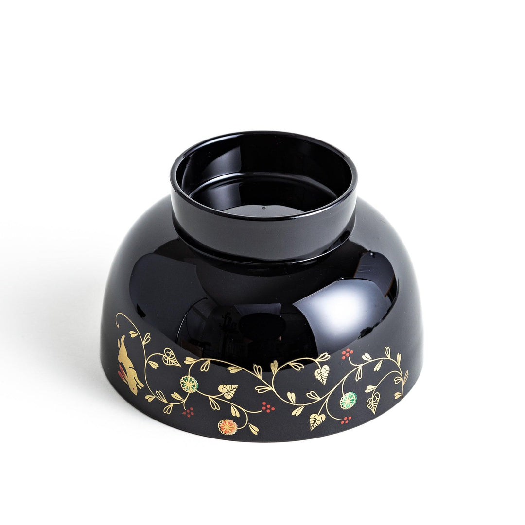 Lacquered soup bowls with lids, featuring golden vine designs. Available in red or black.