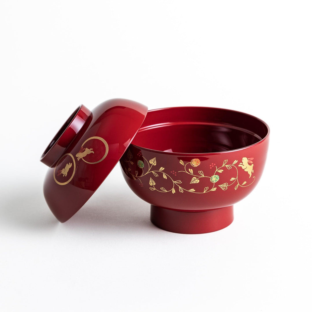 Lacquered soup bowls with lids, featuring golden vine designs. Available in red or black.