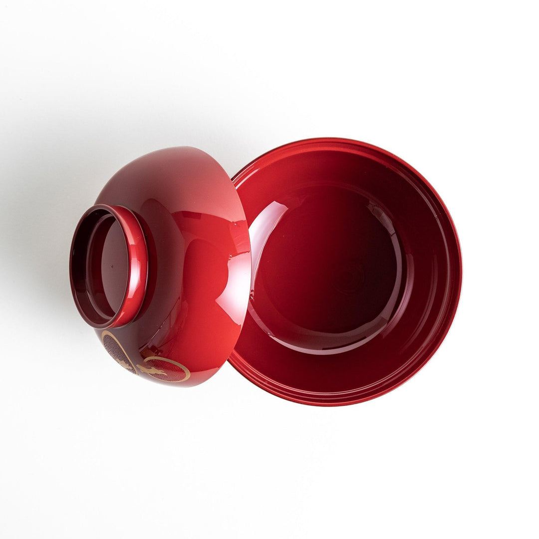Lacquered soup bowls with lids, featuring golden vine designs. Available in red or black.