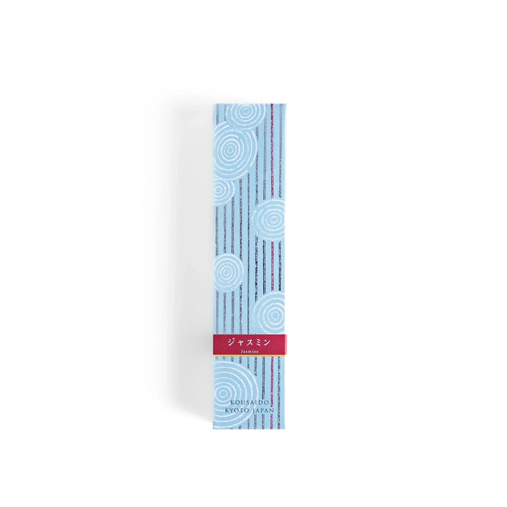 Japanese jasmine incense in wooden box with teal sticks and white circle pattern design for fresh floral scent.