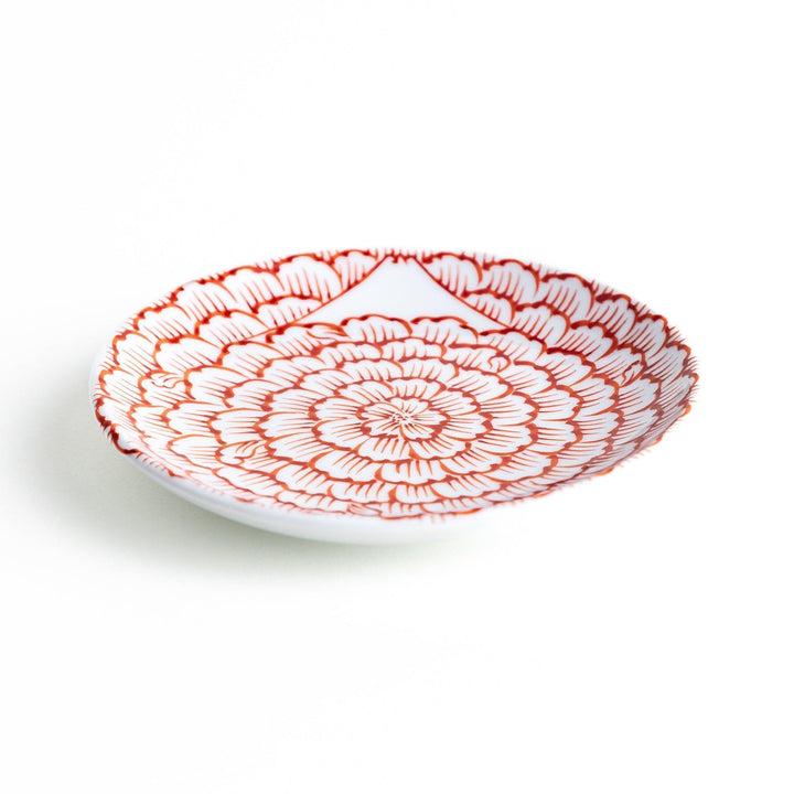 Round plate with a red chrysanthemum petal design.