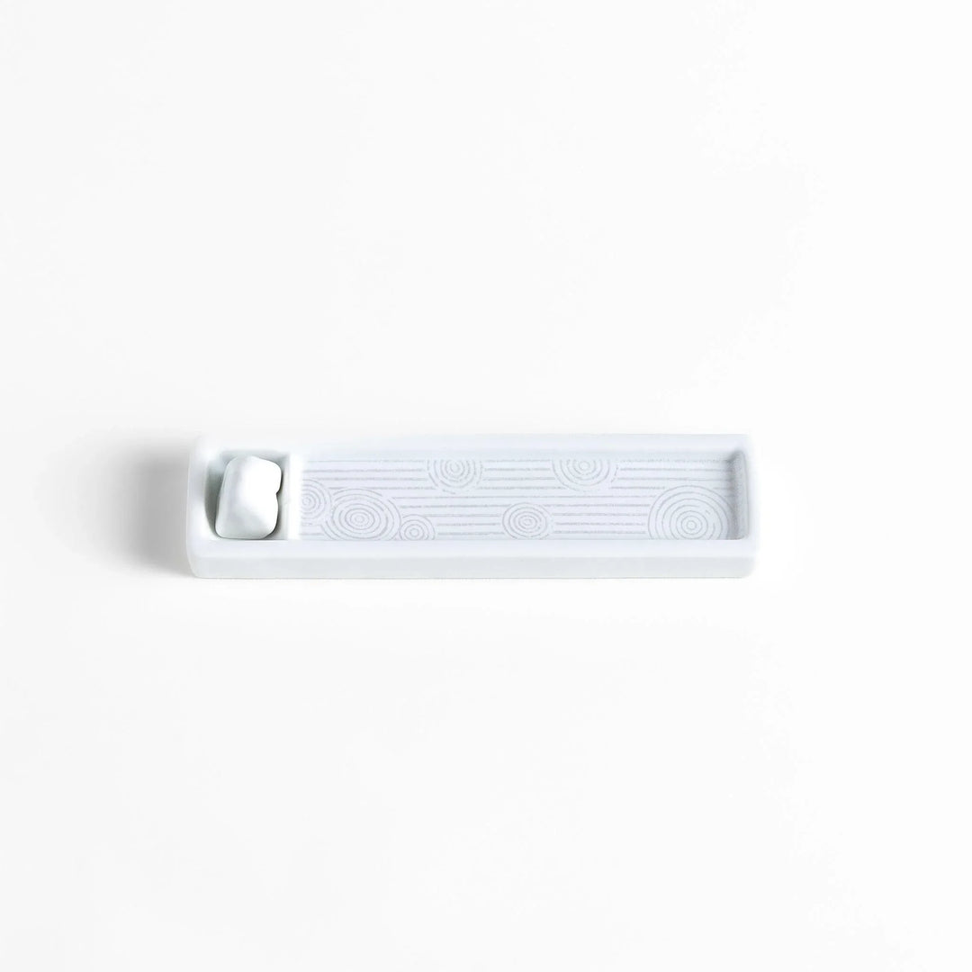 Zen-inspired white ceramic Incense Holder featuring a raked sand pattern.