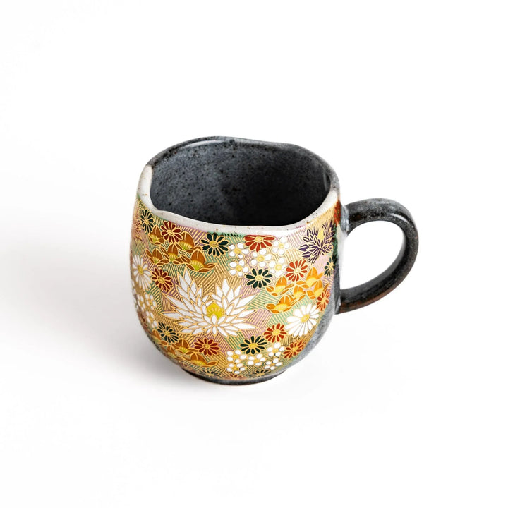 Gray ceramic mug with floral pattern in gold and pastels speckled glaze and comfortable handle design.