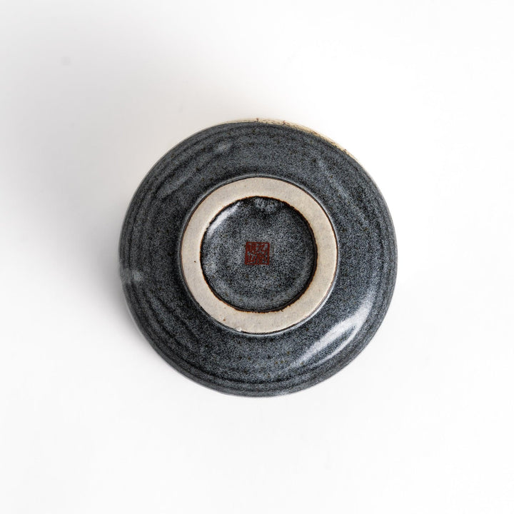 Black matcha bowl with a striking gold crackle effect, adding a touch of elegance to your traditional matcha tea ceremony.