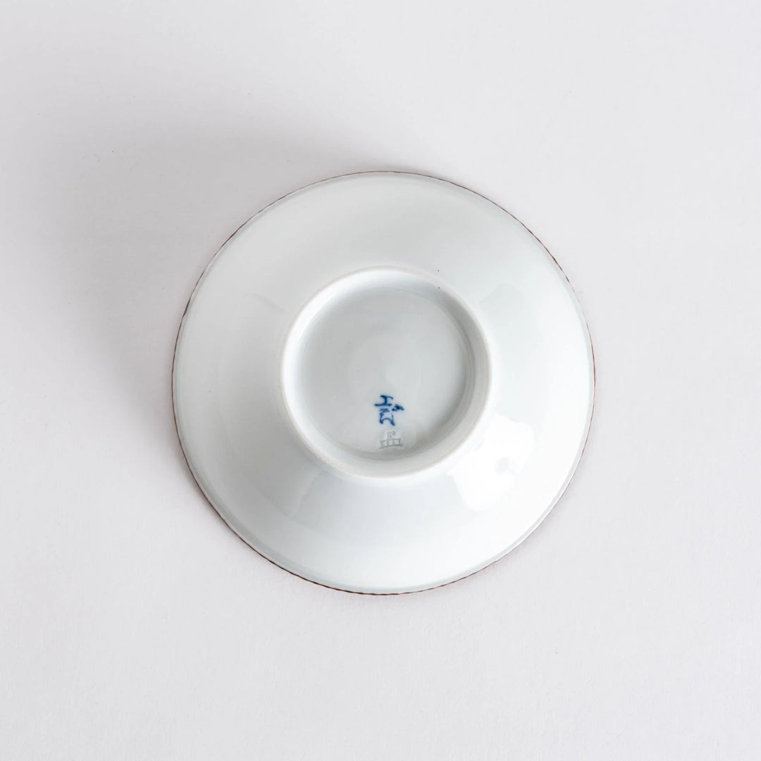 A round white cereal bowl with a rustic scallop-edged border. The border comes in blue, brown, and olive.