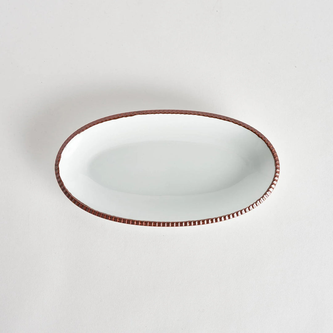 Rustic scallop edged oval salad plate with natural glaze ideal for serving fresh salads or side dishes.