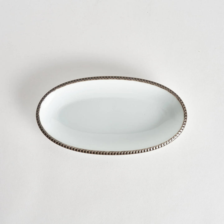 Rustic scallop edged oval salad plate with natural glaze ideal for serving fresh salads or side dishes.