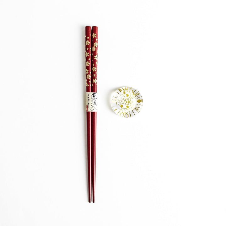 Red lacquer chopsticks with sakura patterns. Available in black or red.
