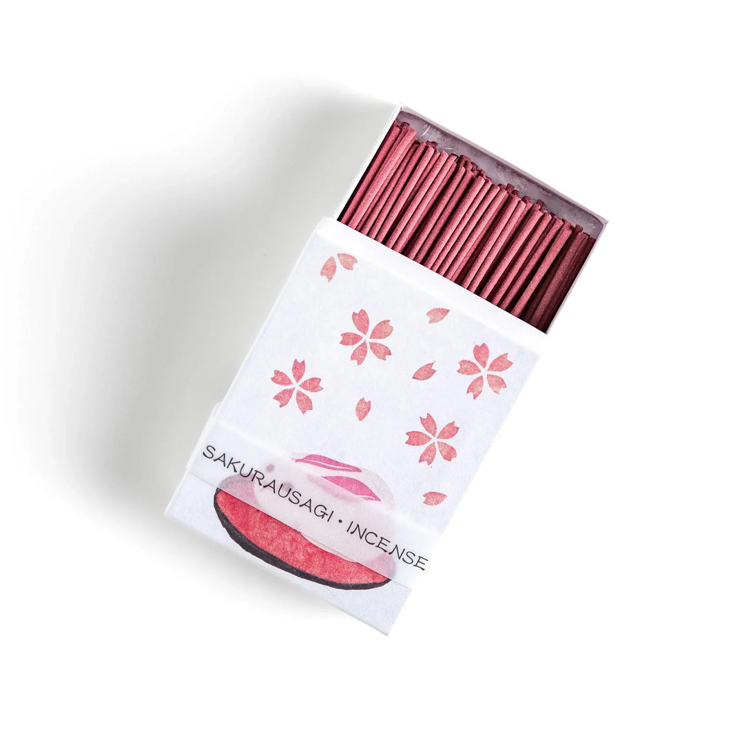 Incense with pink sticks in a sakura rabbit motif box offering a floral fragrance inspired by spring cherry blossoms.