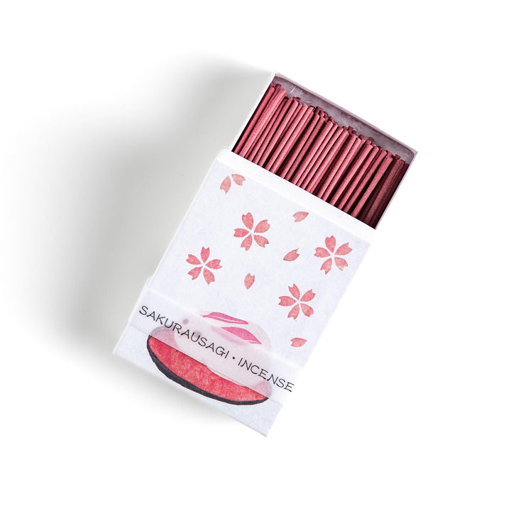 Incense with pink sticks in a sakura rabbit motif box offering a floral fragrance inspired by spring cherry blossoms.