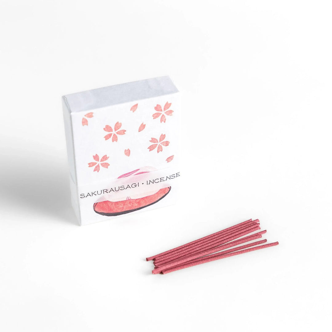 Incense with pink sticks in a sakura rabbit motif box offering a floral fragrance inspired by spring cherry blossoms.