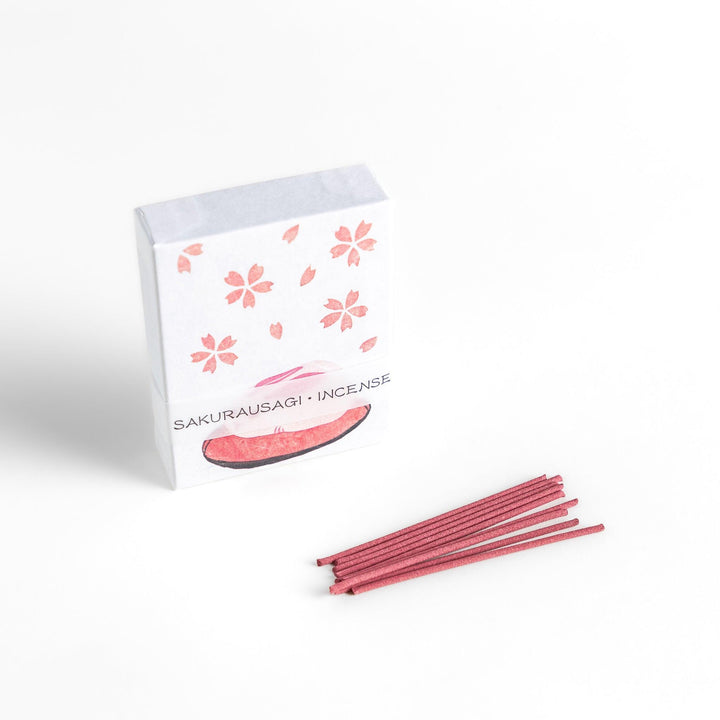 Incense with pink sticks in a sakura rabbit motif box offering a floral fragrance inspired by spring cherry blossoms.