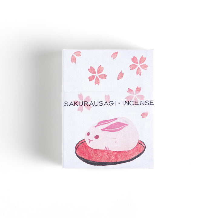 Incense with pink sticks in a sakura rabbit motif box offering a floral fragrance inspired by spring cherry blossoms.