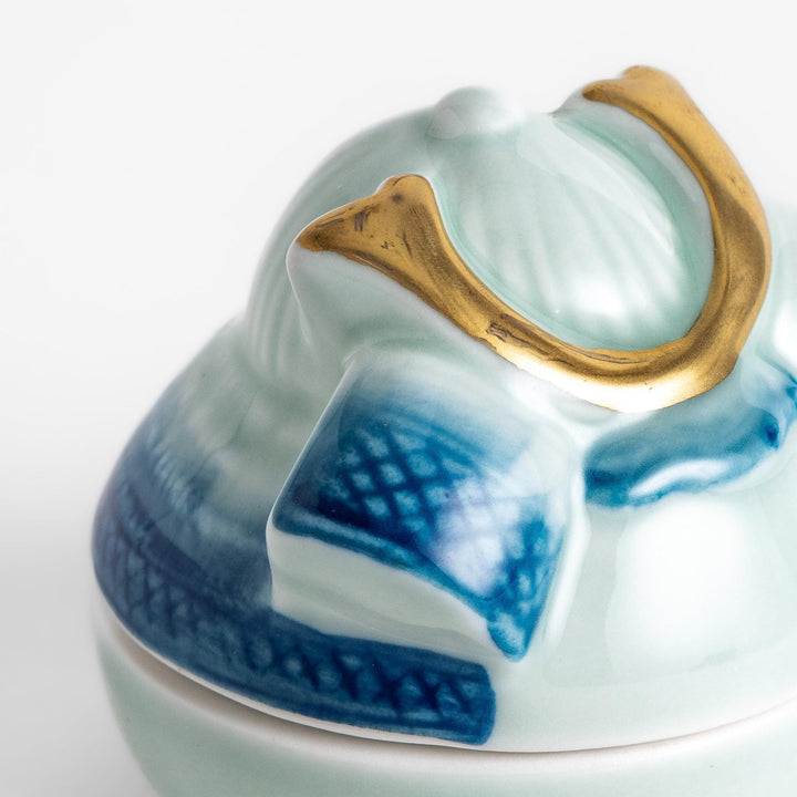 Japanese samurai helmet lidded condiment bowl with blue and gold detailing perfect for sauces or dips.