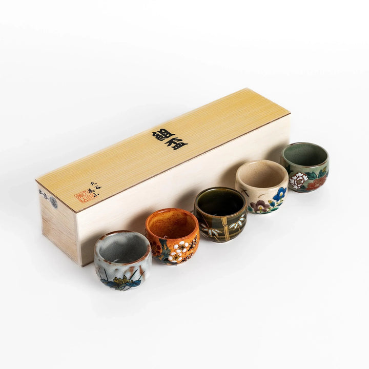 Set of five Sake Cups featuring seasonal blossom designs, perfect for enjoying your favorite sake.