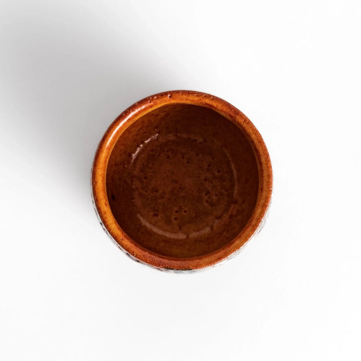 Set of five Sake Cups featuring seasonal blossom designs, perfect for enjoying your favorite sake.