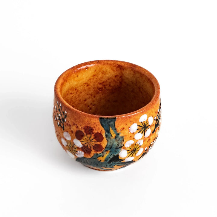 Set of five Sake Cups featuring seasonal blossom designs, perfect for enjoying your favorite sake.