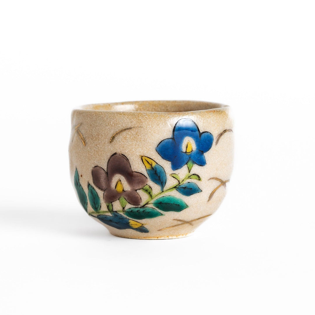 Set of five Sake Cups featuring seasonal blossom designs, perfect for enjoying your favorite sake.
