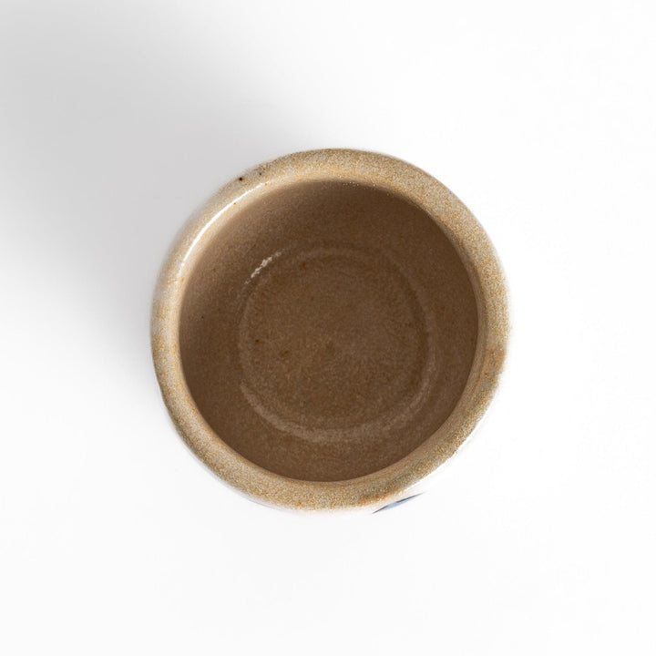 Set of five Sake Cups featuring seasonal blossom designs, perfect for enjoying your favorite sake.