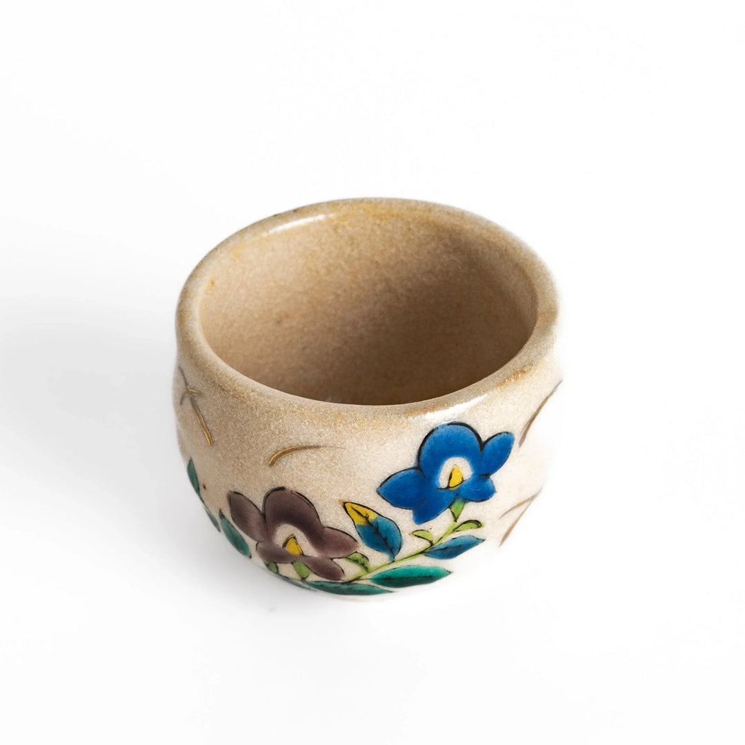 Set of five Sake Cups featuring seasonal blossom designs, perfect for enjoying your favorite sake.