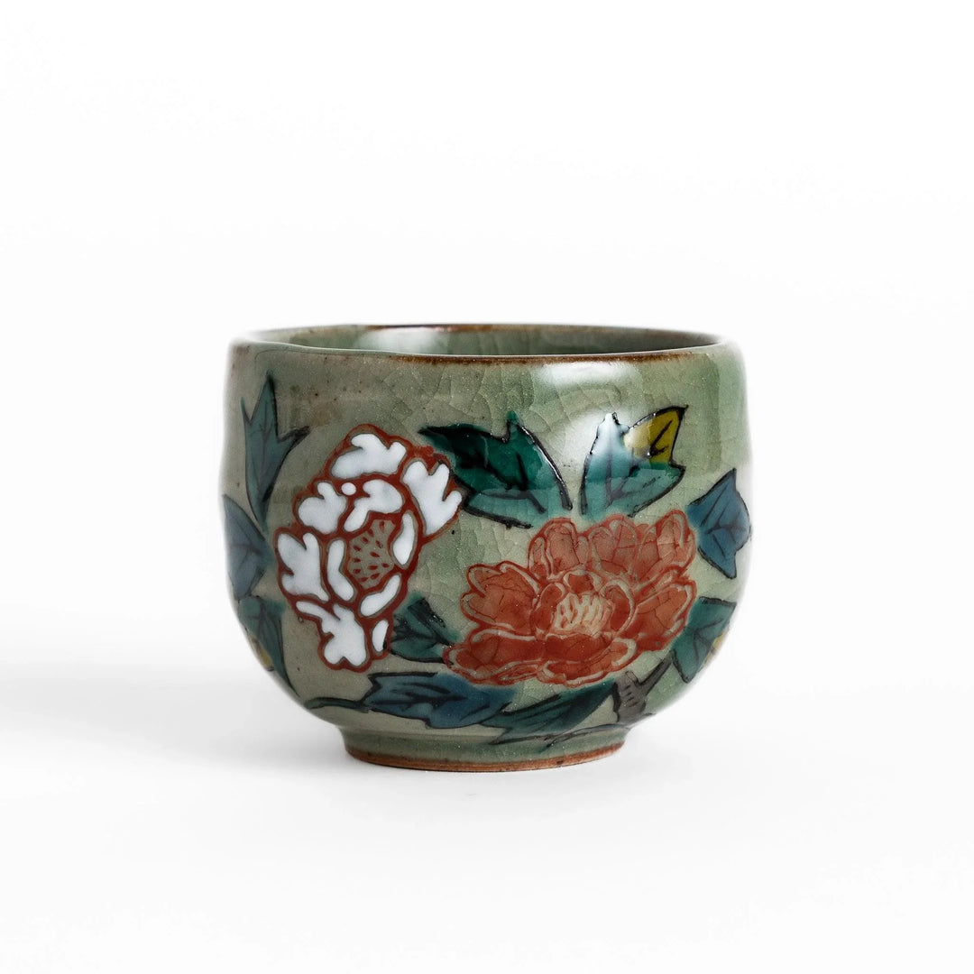 Set of five Sake Cups featuring seasonal blossom designs, perfect for enjoying your favorite sake.