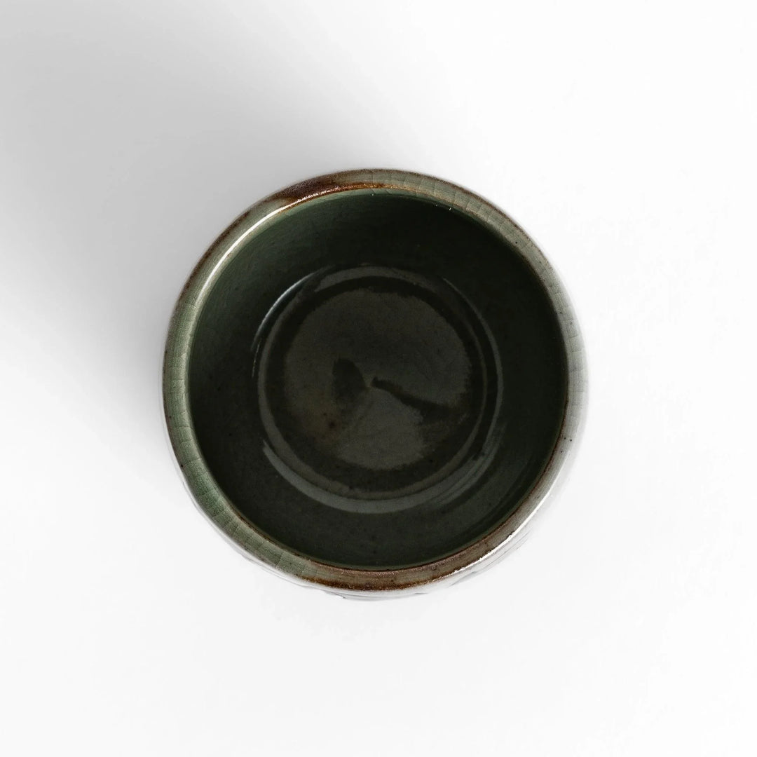 Set of five Sake Cups featuring seasonal blossom designs, perfect for enjoying your favorite sake.