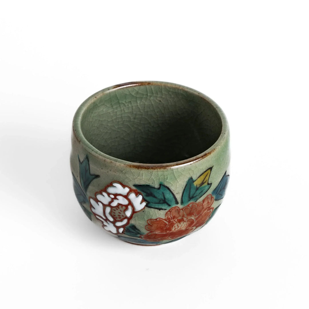 Set of five Sake Cups featuring seasonal blossom designs, perfect for enjoying your favorite sake.