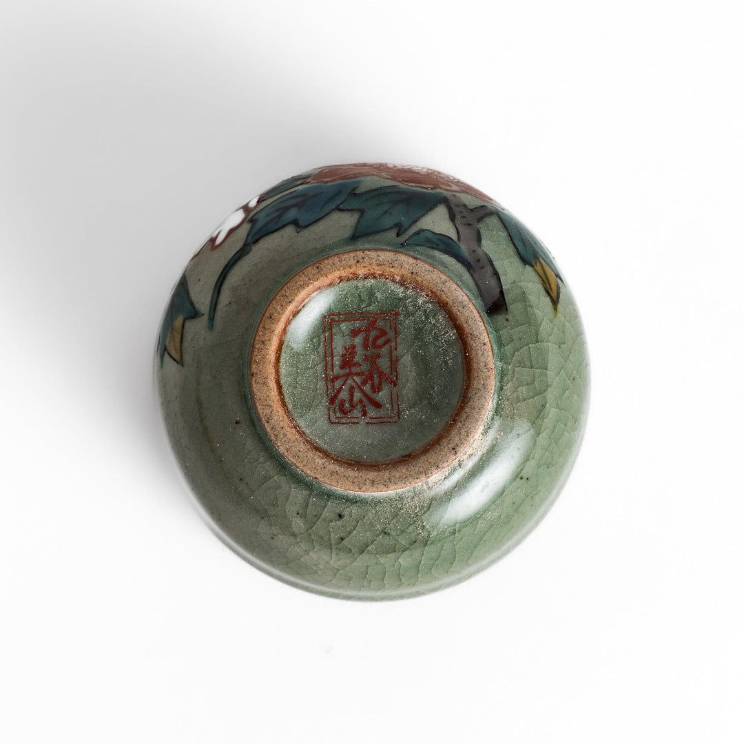 Set of five Sake Cups featuring seasonal blossom designs, perfect for enjoying your favorite sake.