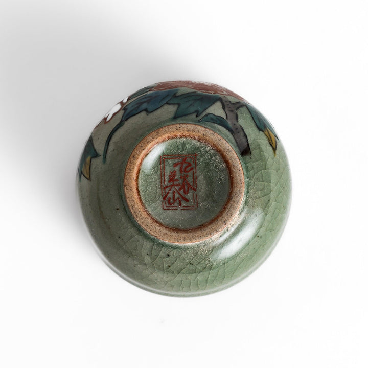 Set of five Sake Cups featuring seasonal blossom designs, perfect for enjoying your favorite sake.