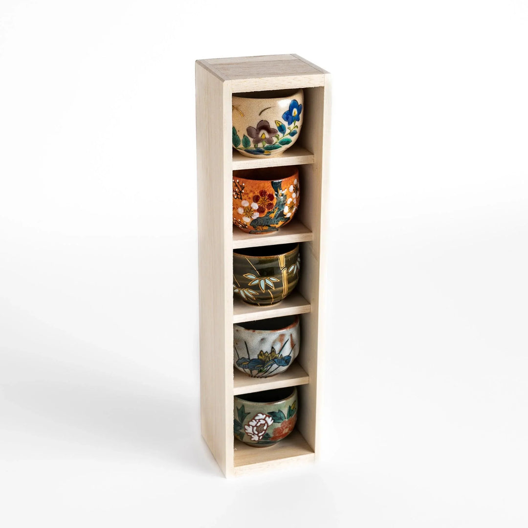 Set of five Sake Cups featuring seasonal blossom designs, perfect for enjoying your favorite sake.