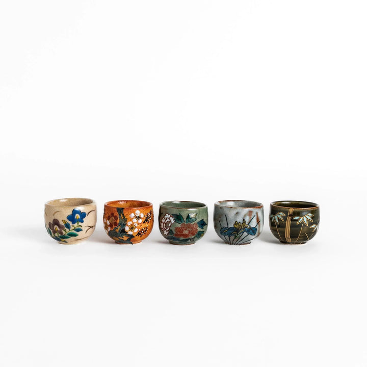 Set of five Sake Cups featuring seasonal blossom designs, perfect for enjoying your favorite sake.