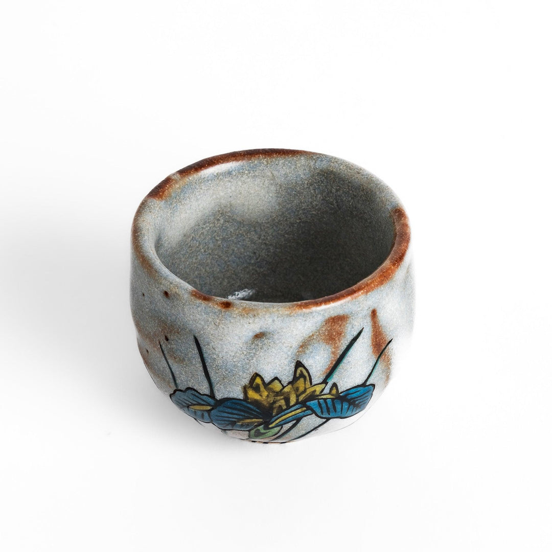 Set of five Sake Cups featuring seasonal blossom designs, perfect for enjoying your favorite sake.