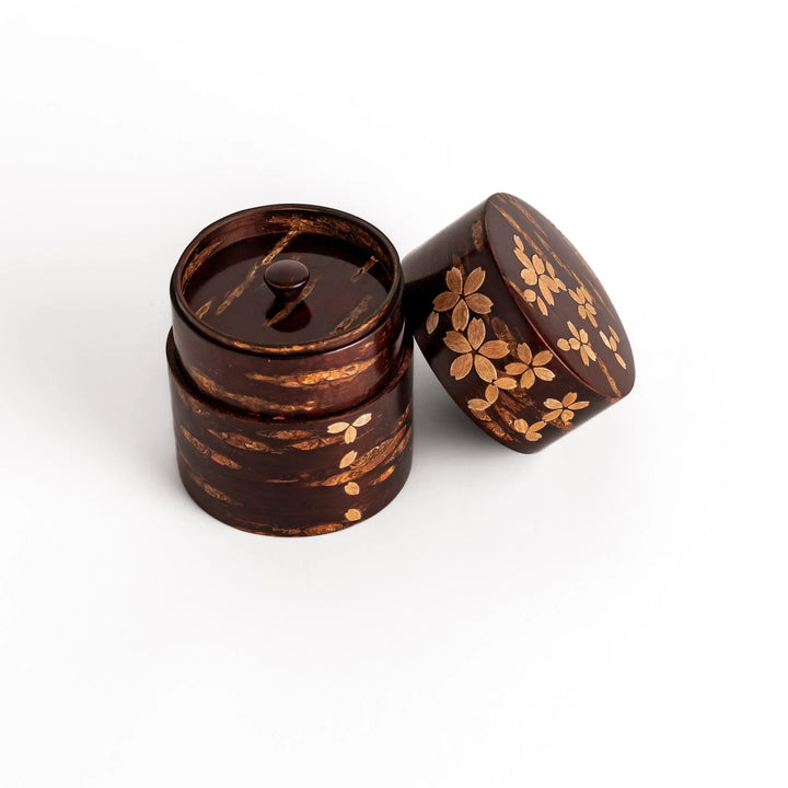 Cherry bark tea canister with natural grain and blossom accents perfect for storing fine Japanese tea.
