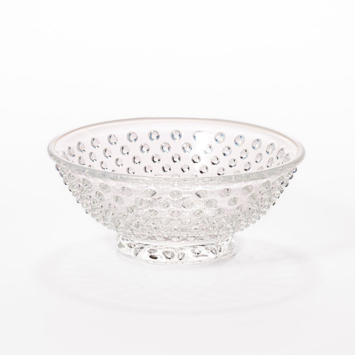 Clear glass dessert bowl and saucer with raised dots and starburst base, perfect for elegant desserts or fruit.