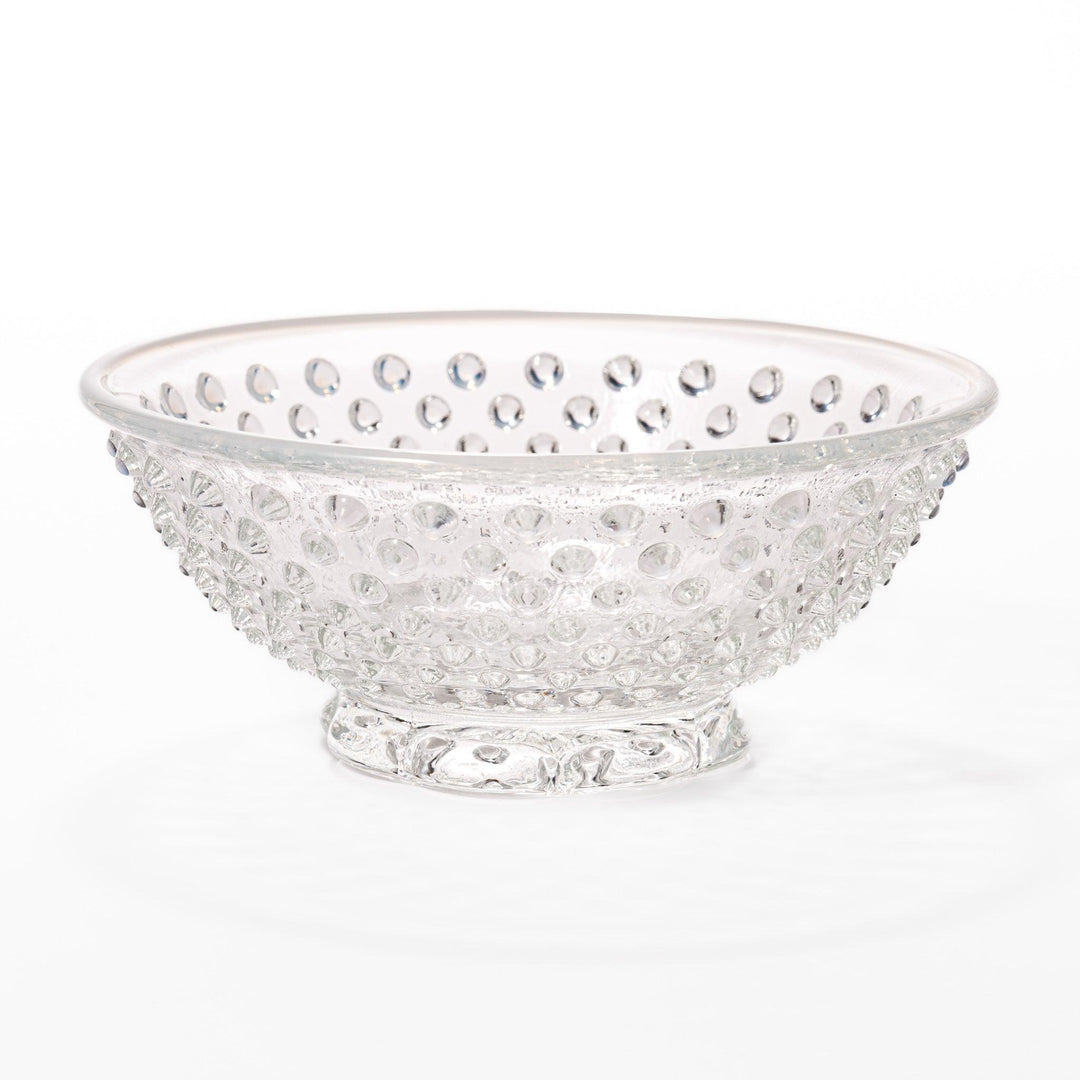 Clear glass dessert bowl and saucer with raised dots and starburst base, perfect for elegant desserts or fruit.
