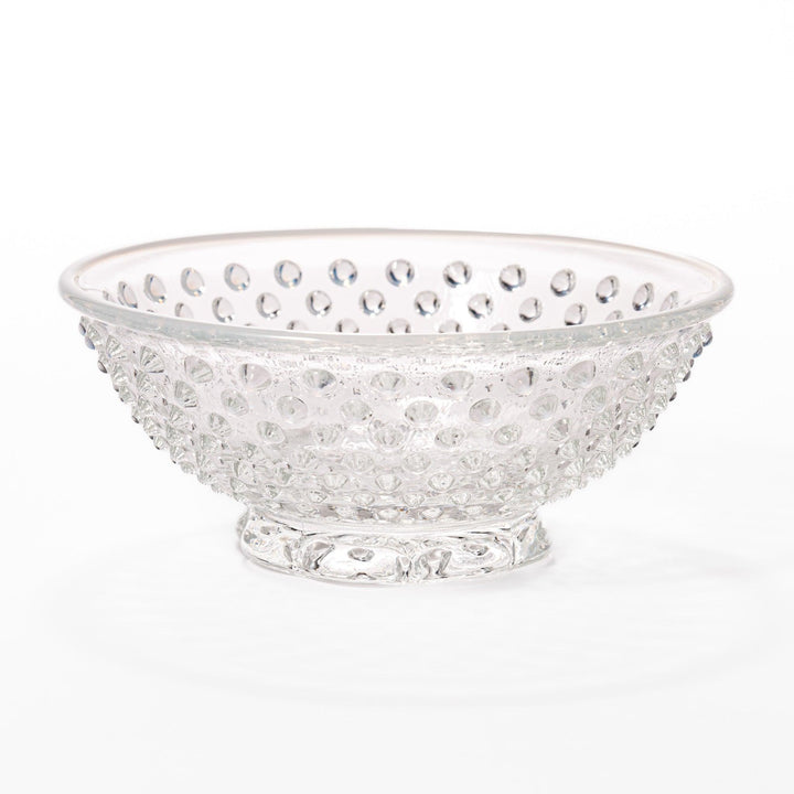 Clear glass dessert bowl and saucer with raised dots and starburst base, perfect for elegant desserts or fruit.