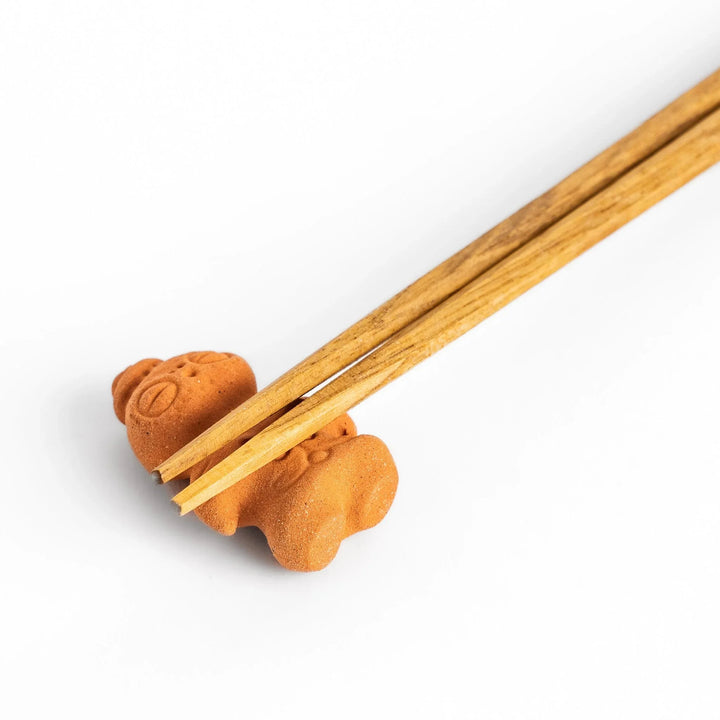Chopstick rest designed as a spiritual shaman figure, featuring intricate details that evoke a sense of mysticism and charm. 