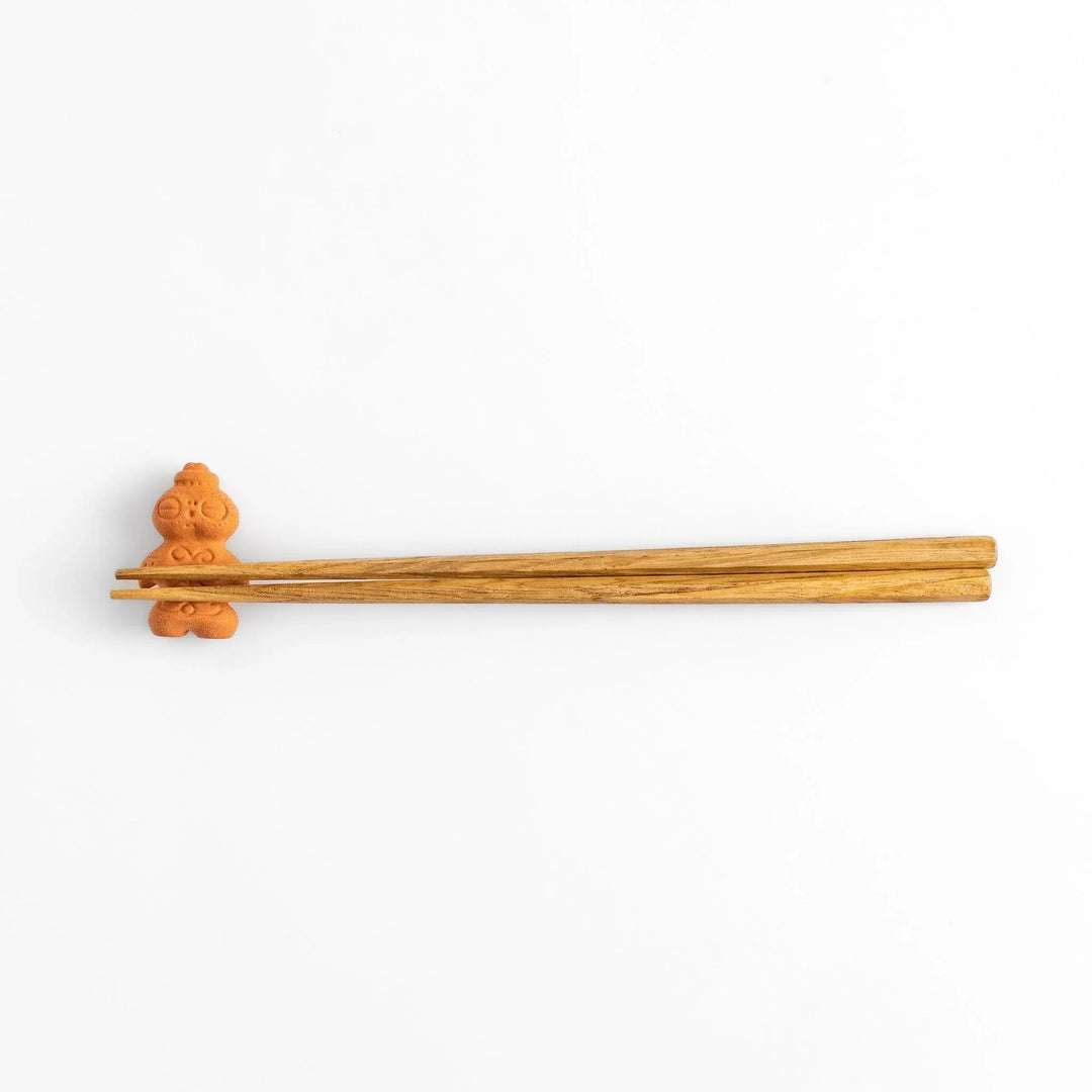Chopstick rest designed as a spiritual shaman figure, featuring intricate details that evoke a sense of mysticism and charm. 