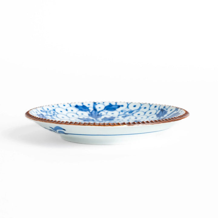 Dessert Plate featuring a beautiful blue spotted floral design with a delicate, beaded rim for an elegant touch.