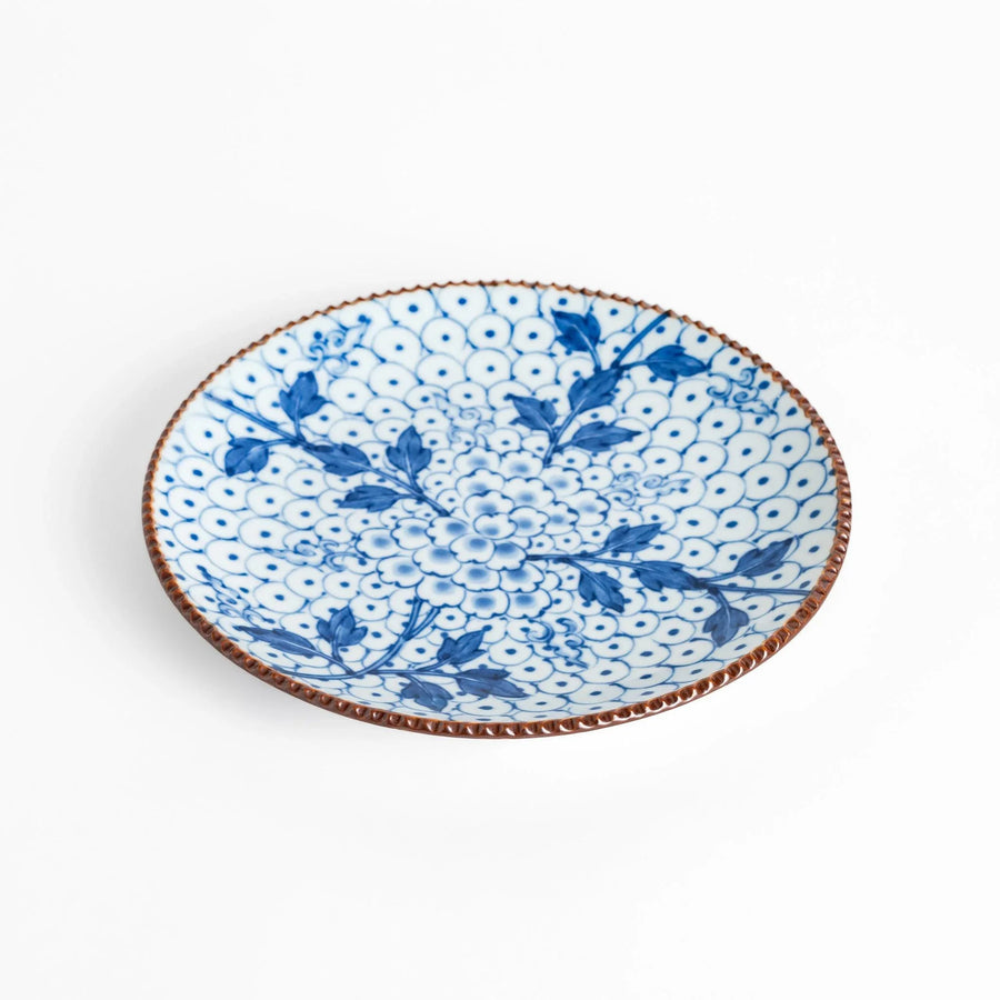 Salad Plate featuring a delicate blue spotted floral design with a beaded rim for an elegant touch.