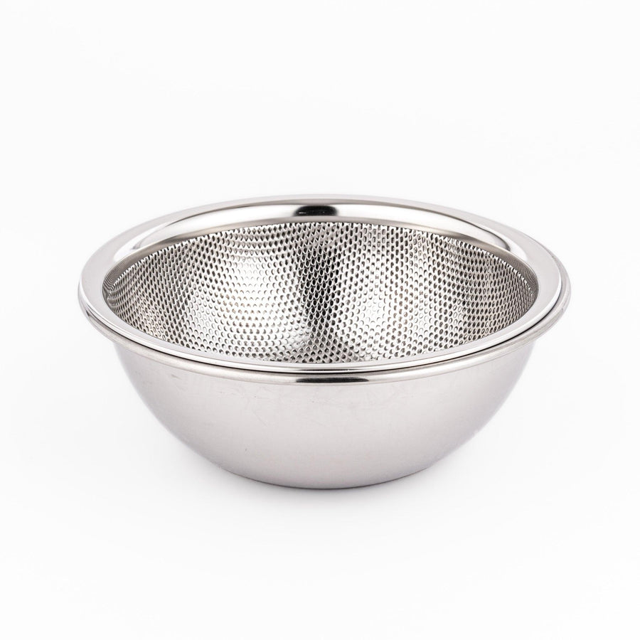 Compact stainless mesh strainer bowl with fine holes and sturdy rim, ideal for small rinsing and draining tasks.